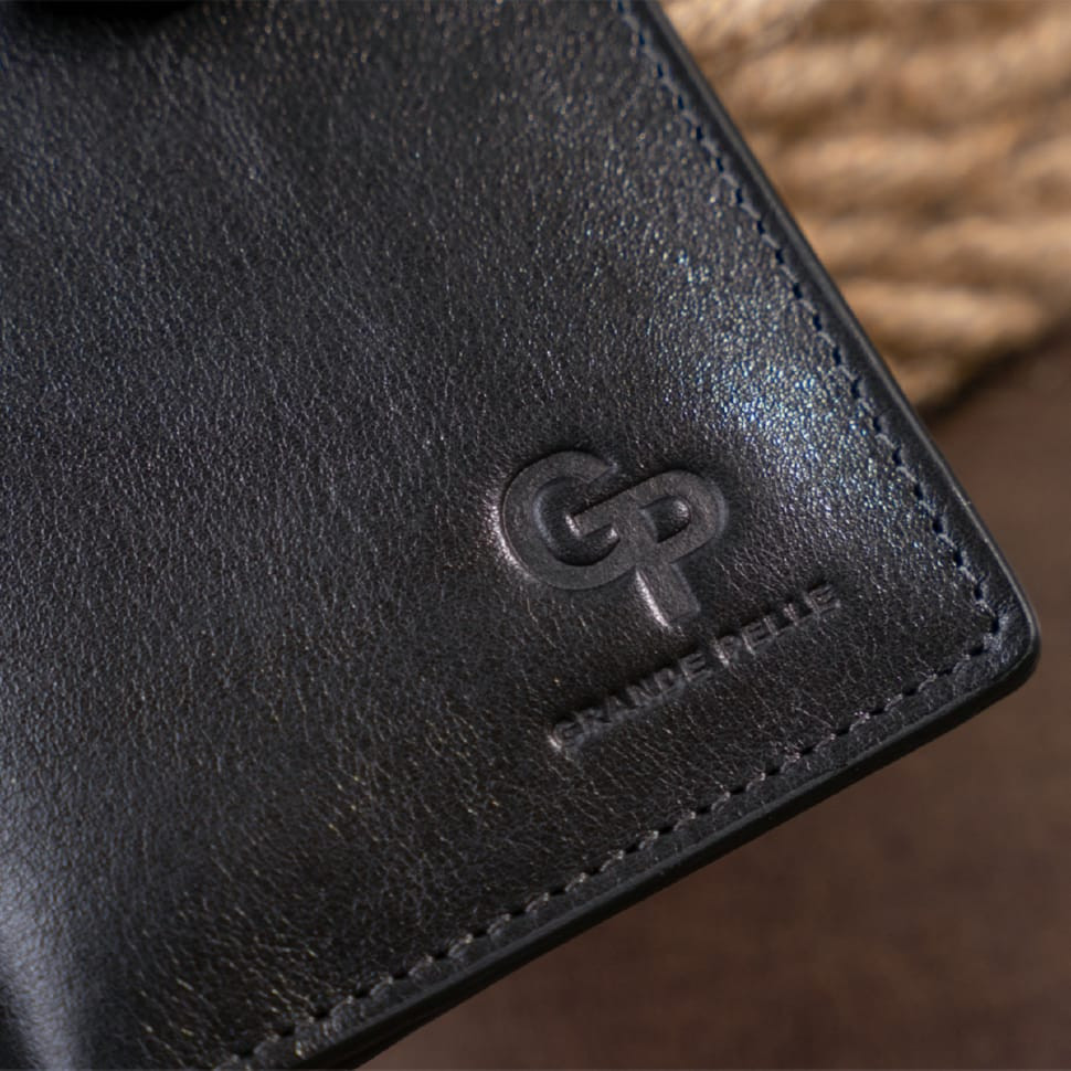 Вертикальний гаманець глянцевий Anet на кнопці GRANDE PELLE 11324 Чорний