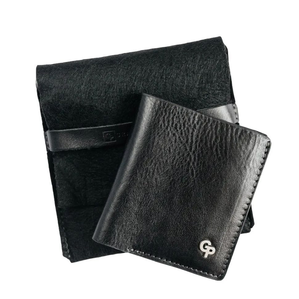 Чоловічий шкіряний портмоне біфолд з монетницею Grande Pelle 528610 чорний