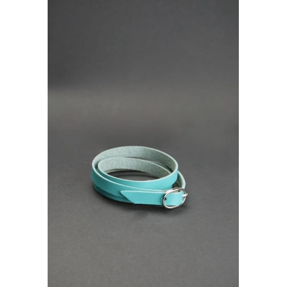 Жіночий шкіряний браслет стрічка з бірюзовий пряжкою.