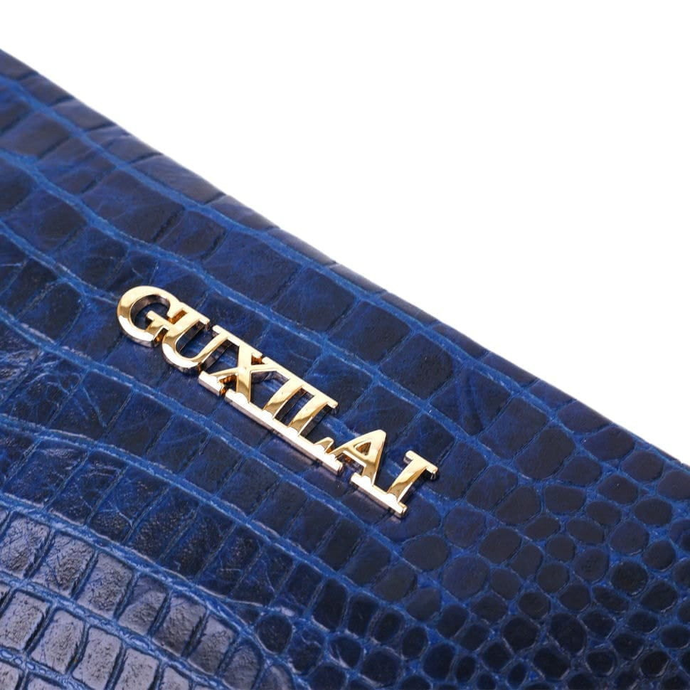 Гаманець жіночий шкіряний з тисненням під екзотику Guxilai 18963 Синій