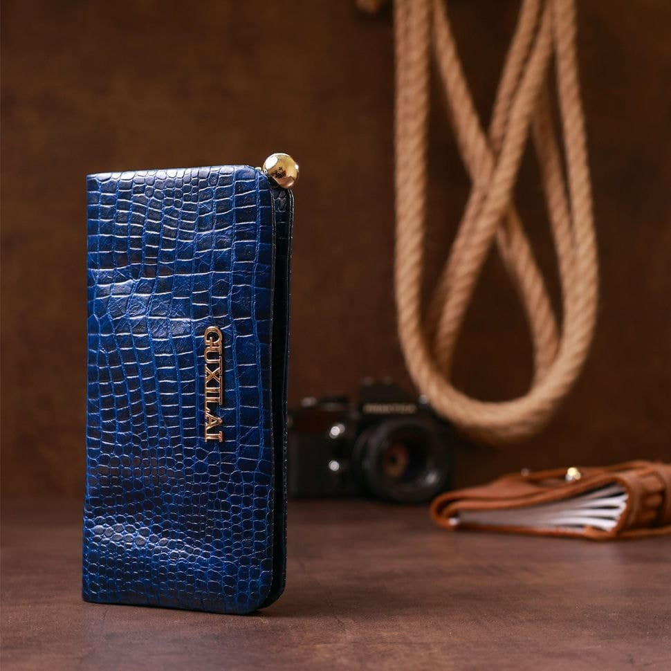 Гаманець жіночий шкіряний з тисненням під екзотику Guxilai 18963 Синій