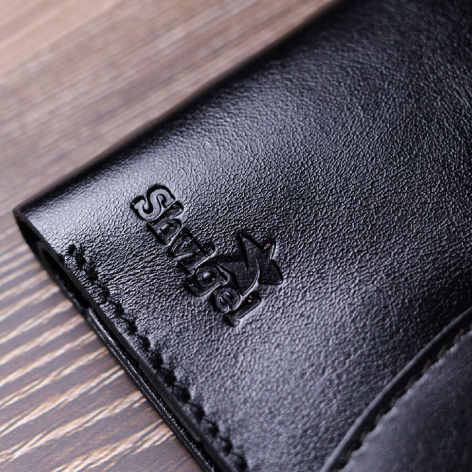 Чоловічий глянсовий шкіряний портмоне Shvigel 16617 Чорний