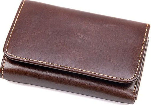 Місткий вертикальний чоловічий гаманець із фактурної шкіри KARYA 20991 Коричневий