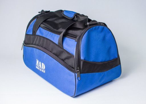 Сумка каркасної форми TWIST синя від MAD | born to win