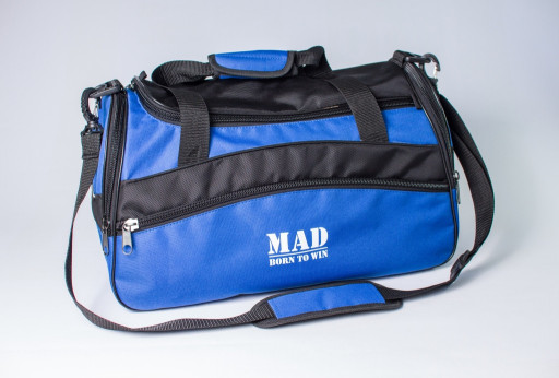 Сумка каркасної форми TWIST синя від MAD | born to win