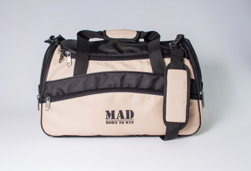 Стильна спортивна сумка TWIST бежева від MAD |