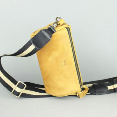 Cylinder yellow vintage leather crossbody bag