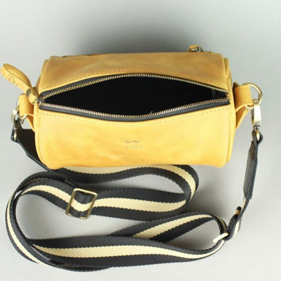 Cylinder yellow vintage leather crossbody bag