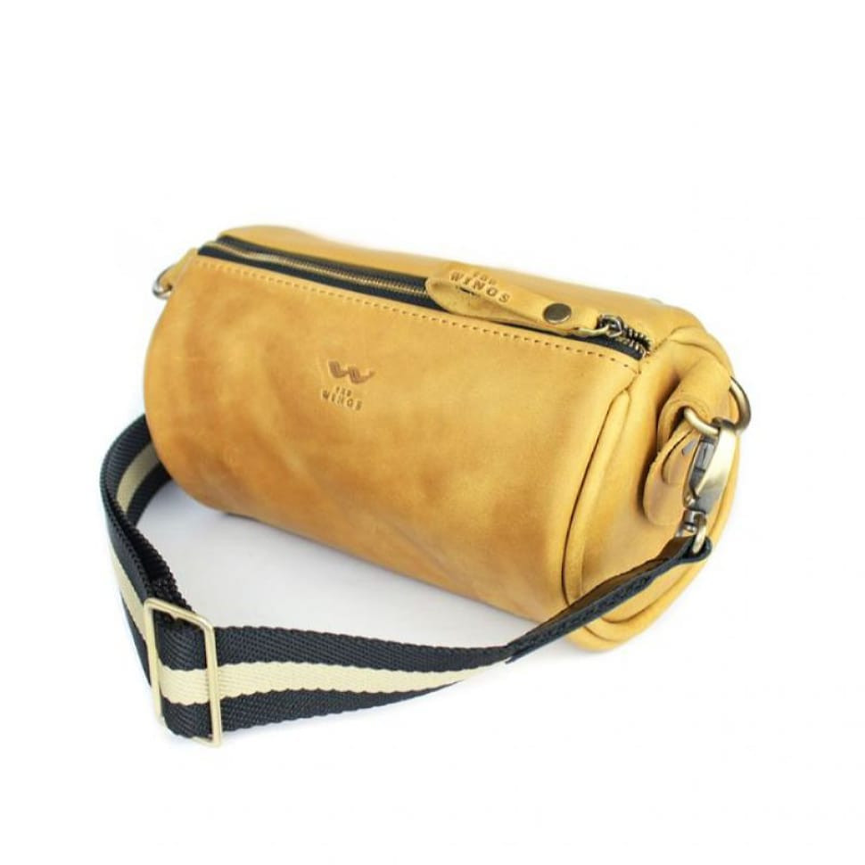 Cylinder yellow vintage leather crossbody bag