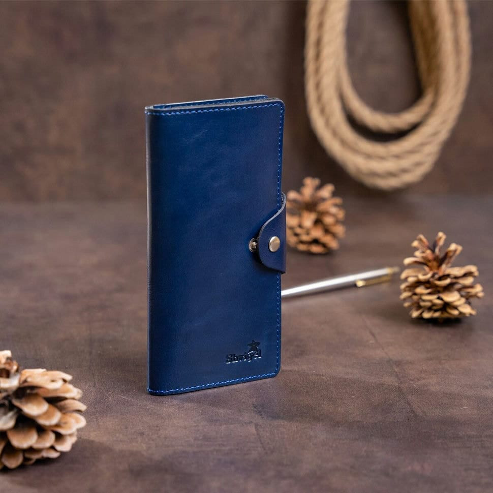 Гаманець унісекс зі шкіри Алькор на кнопках SHVIGEL 16170 Синій