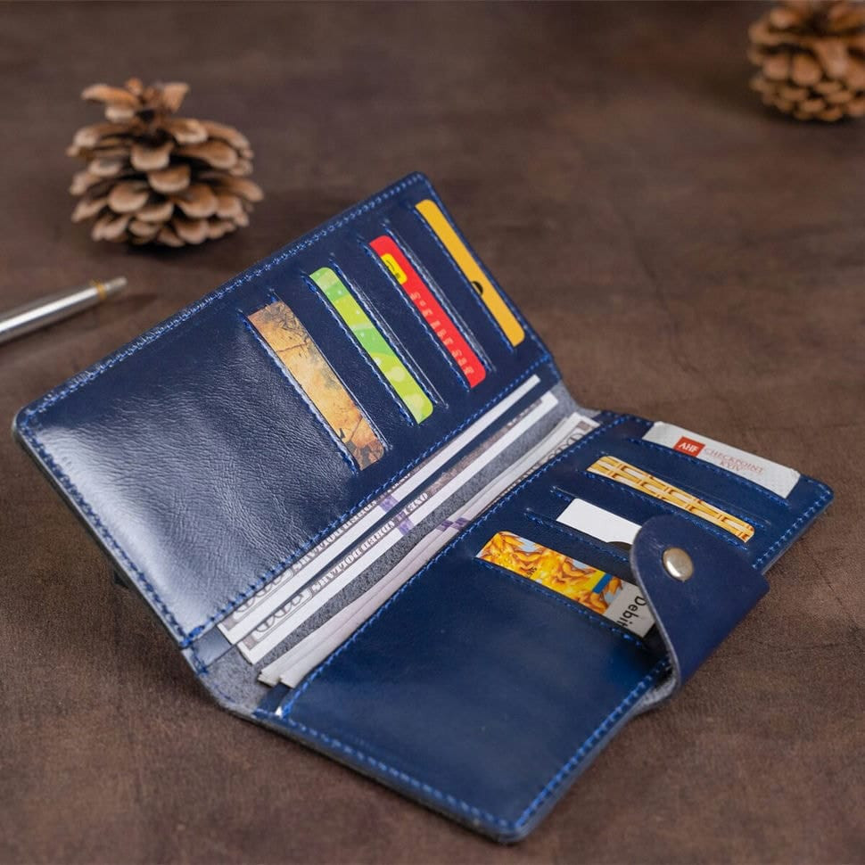 Гаманець унісекс зі шкіри Алькор на кнопках SHVIGEL 16170 Синій