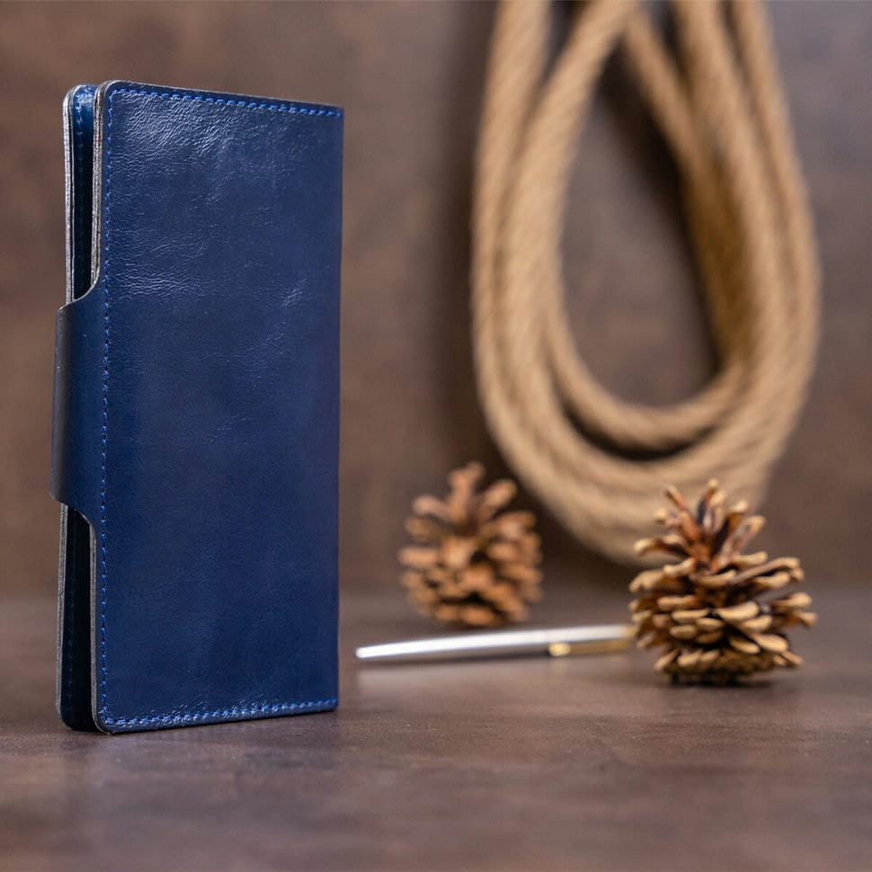 Гаманець унісекс зі шкіри Алькор на кнопках SHVIGEL 16170 Синій