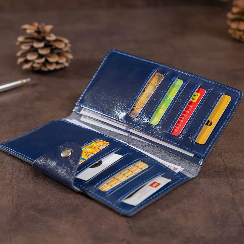 Гаманець унісекс зі шкіри Алькор на кнопках SHVIGEL 16170 Синій