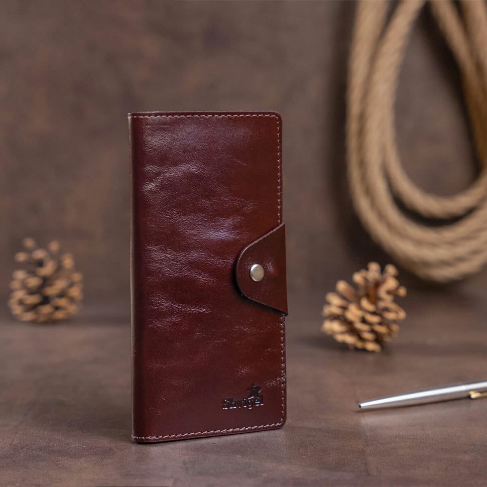 Гаманець вертикальний зі шкіри Алькор на кнопках SHVIGEL 16171 Коричневий