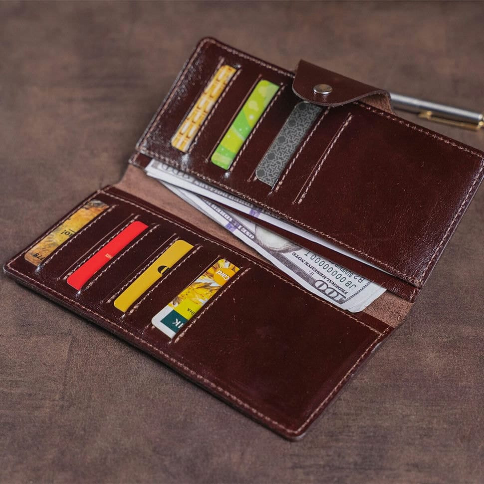 Гаманець вертикальний зі шкіри Алькор на кнопках SHVIGEL 16171 Коричневий