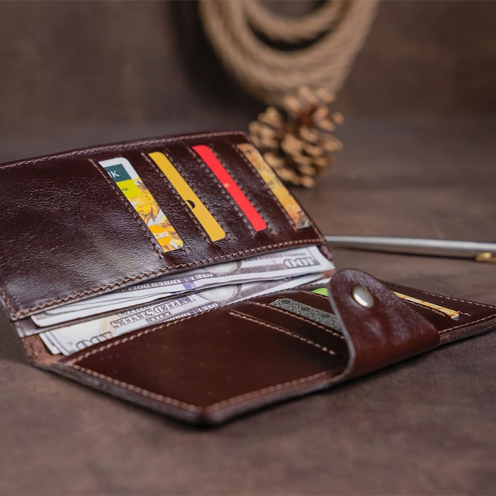 Гаманець вертикальний зі шкіри Алькор на кнопках SHVIGEL 16171 Коричневий