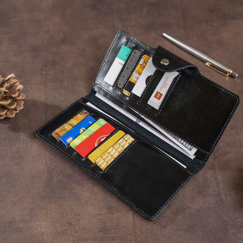 Гаманець чоловічий вертикальний зі шкіри Алькор на кнопках SHVIGEL 16173 Чорний