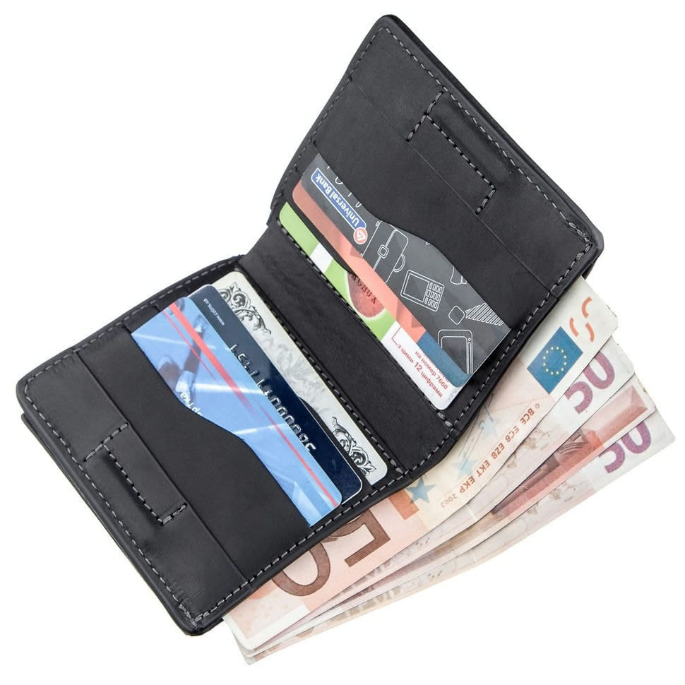 Оригінальна портмоне унісекс з накладної монетницьою GRANDE PELLE 11222 Чорне