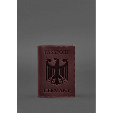 Leather passport cover with the coat of arms of Germany burgundy Crazy Horse
