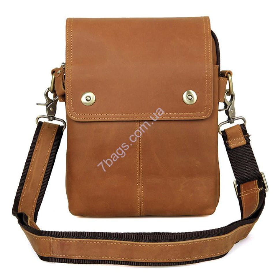 A laconic and practical tablet bag made of natural reddish brown calfskin