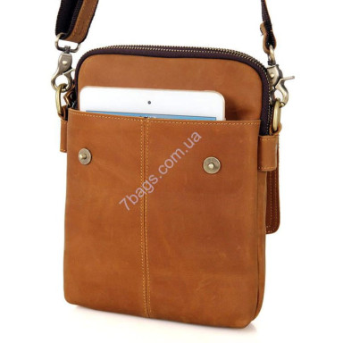 A laconic and practical tablet bag made of natural reddish brown calfskin