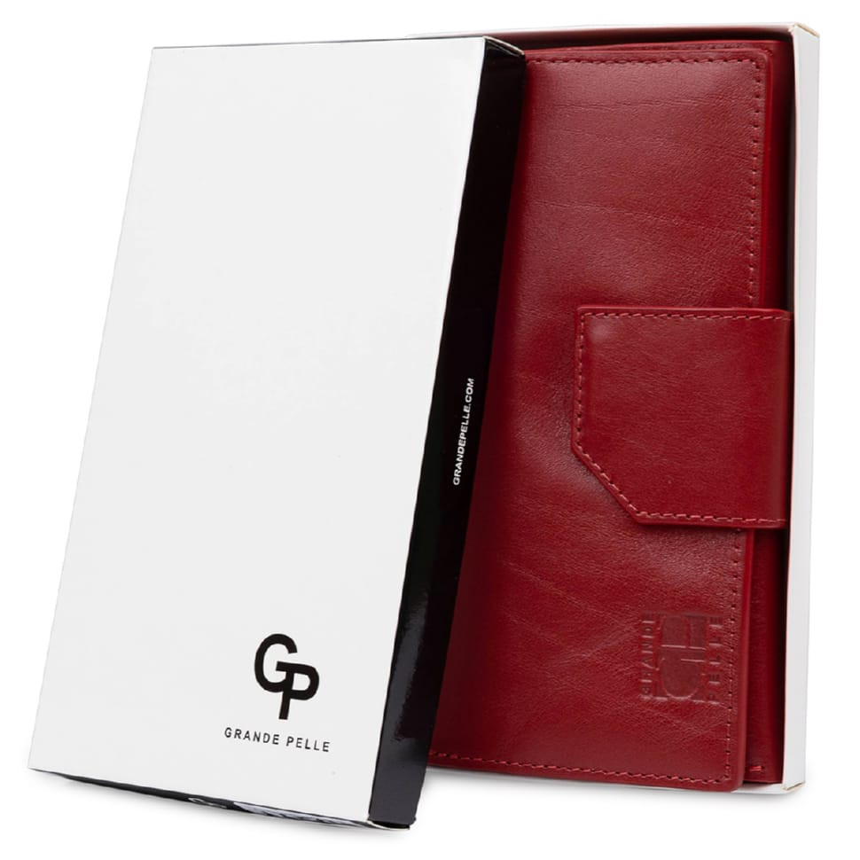 Шикарний жіночий гаманець у три складання GRANDE PELLE 11564 Червоний