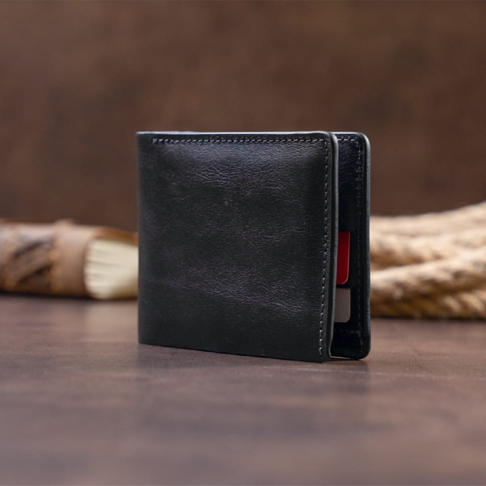 Горизонтальне портмоне в гладкій шкірі без застібки GRANDE PELLE 11311 Чорне