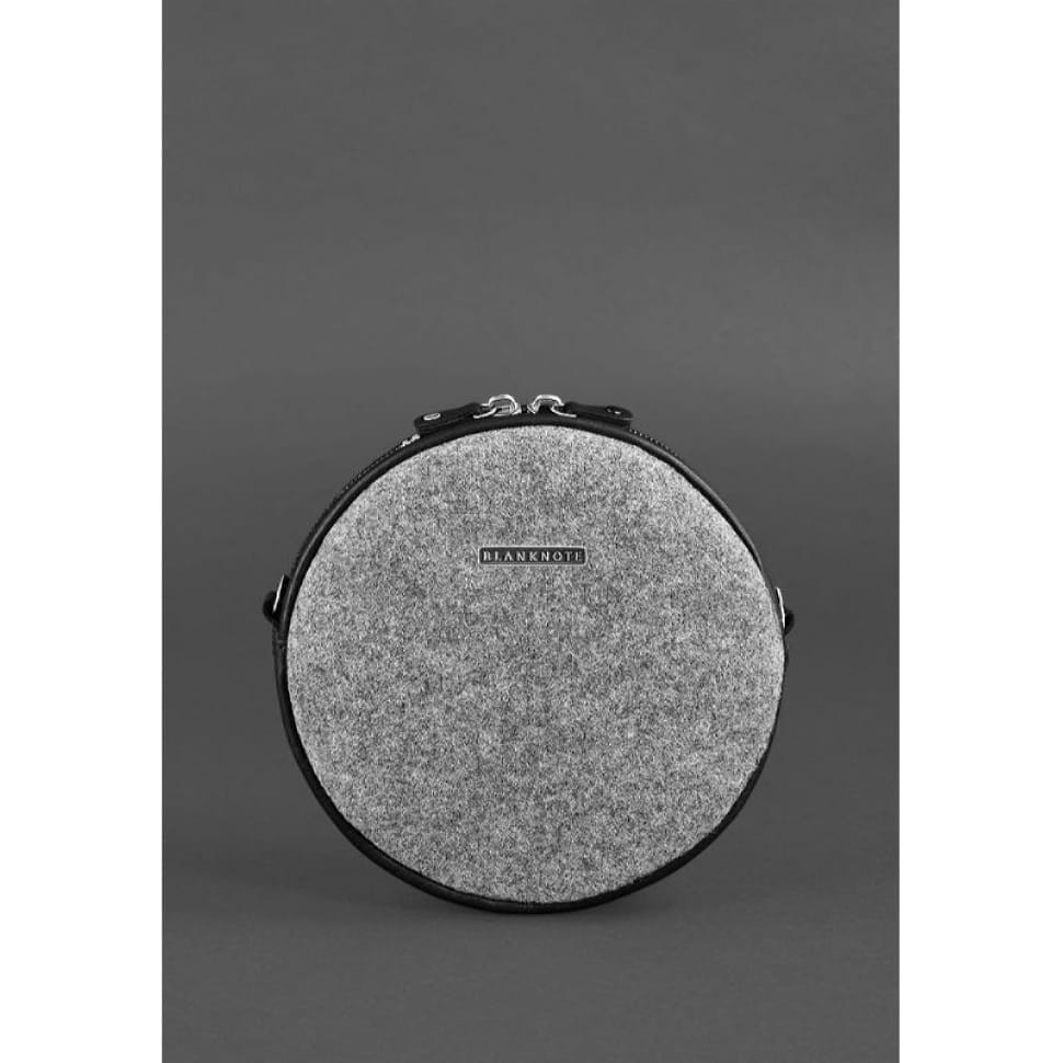 Кругла фетрова жіноча сумка Таблетка зі шкіряними чорними вставками