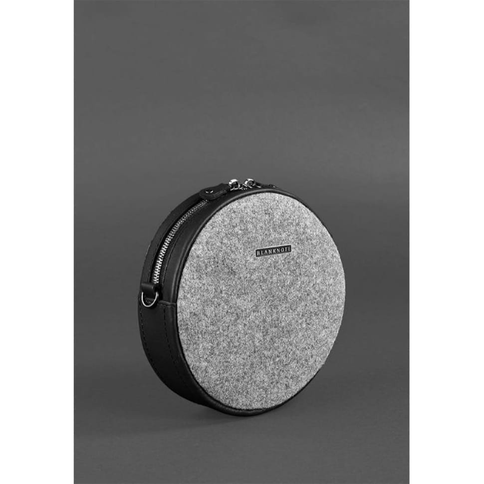 Кругла фетрова жіноча сумка Таблетка зі шкіряними чорними вставками