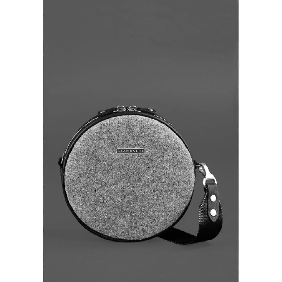 Кругла фетрова жіноча сумка Таблетка зі шкіряними чорними вставками